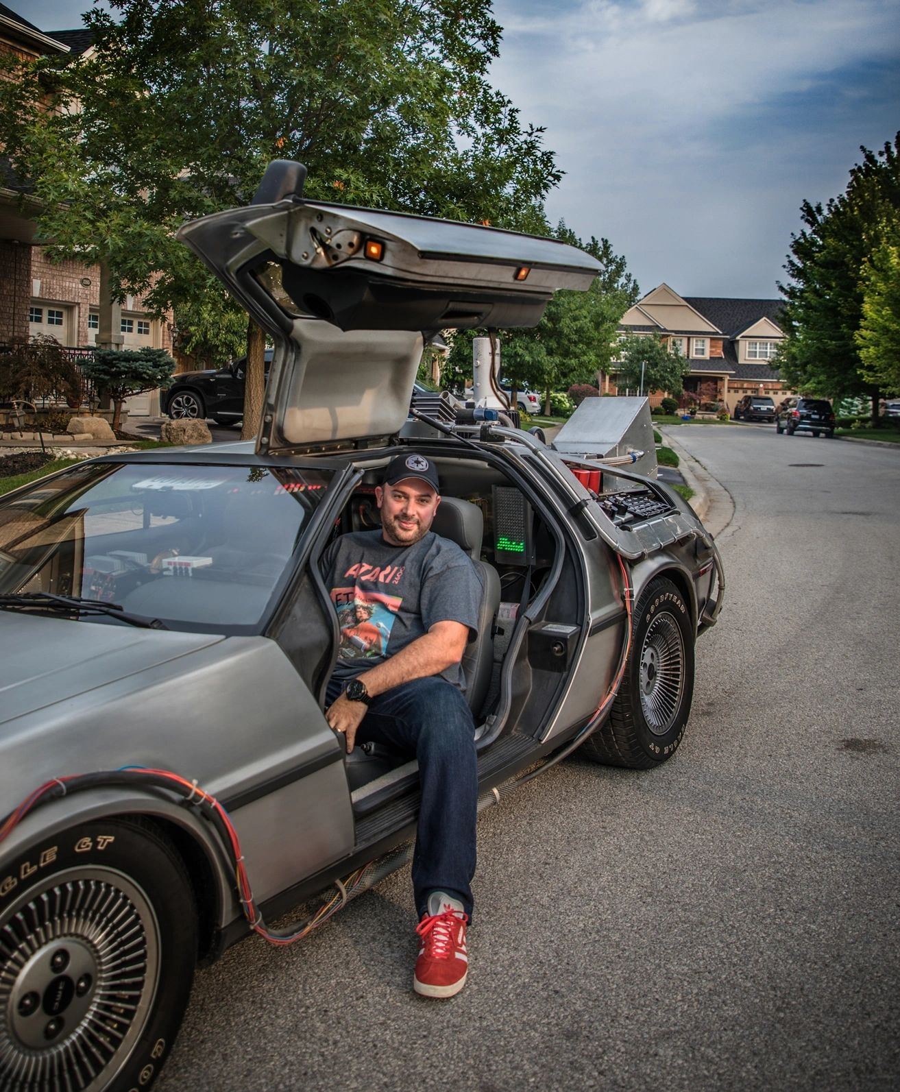 DJ Frankie F Fresh sitting in the DeLorean time machine
